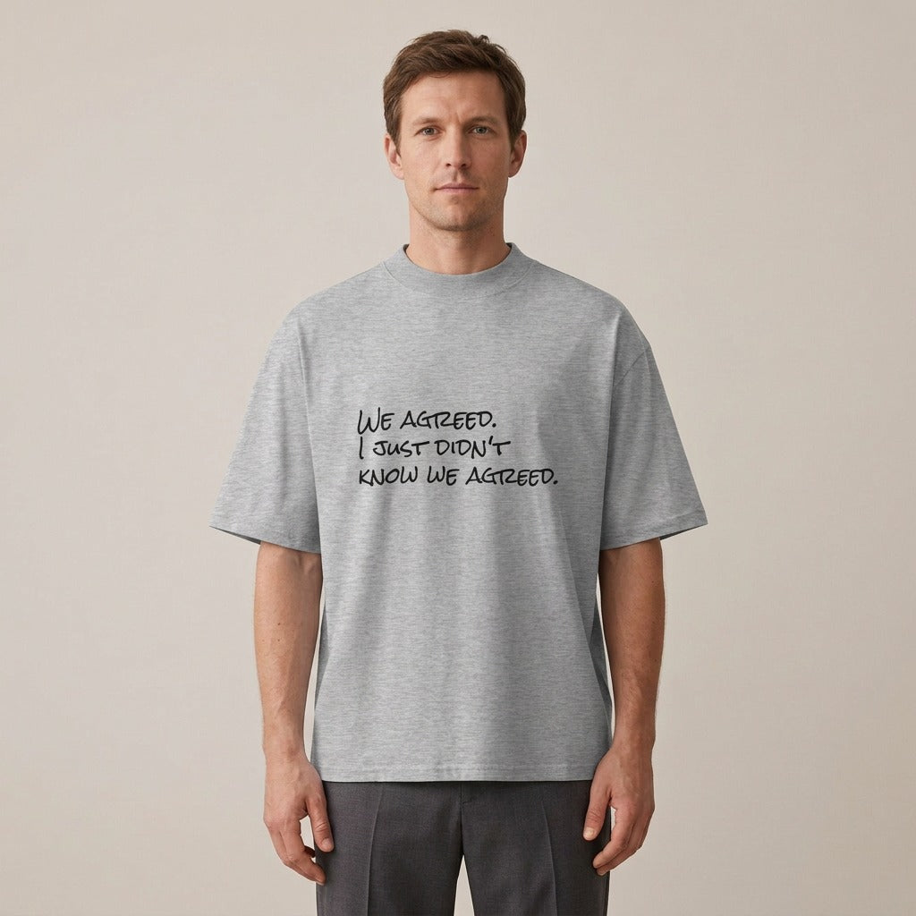 Man wearing the We Agreed. I Just Didn't Know We Agreed. t-shirt in heather grey