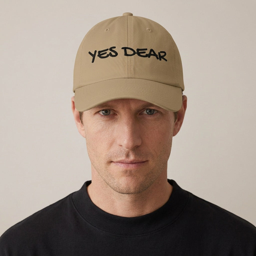 Man wearing the Yes Dear embroidered dad hat in khaki