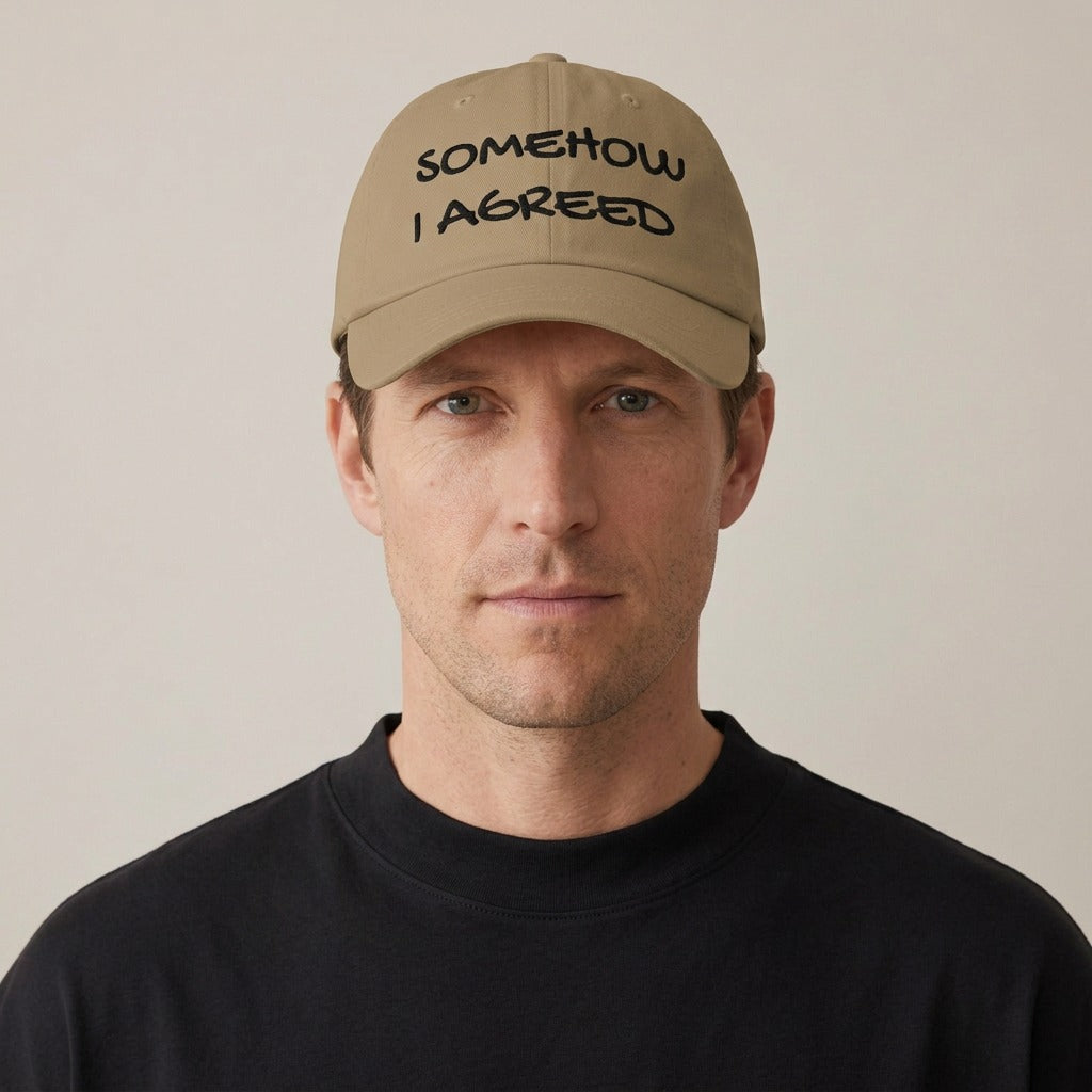 Man wearing the Somehow I Agreed embroidered dad hat in khaki